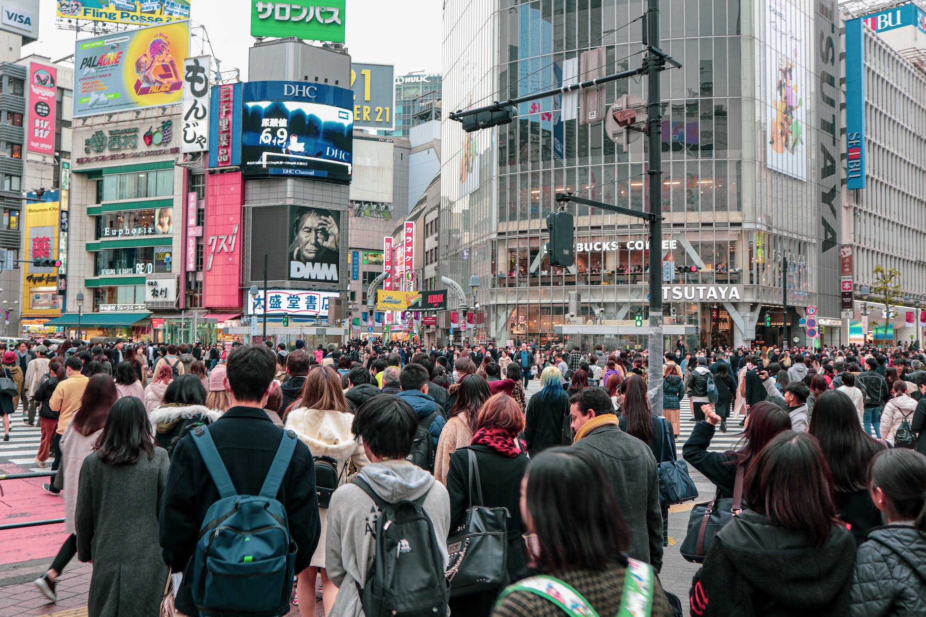 unrecognizable people on city street
