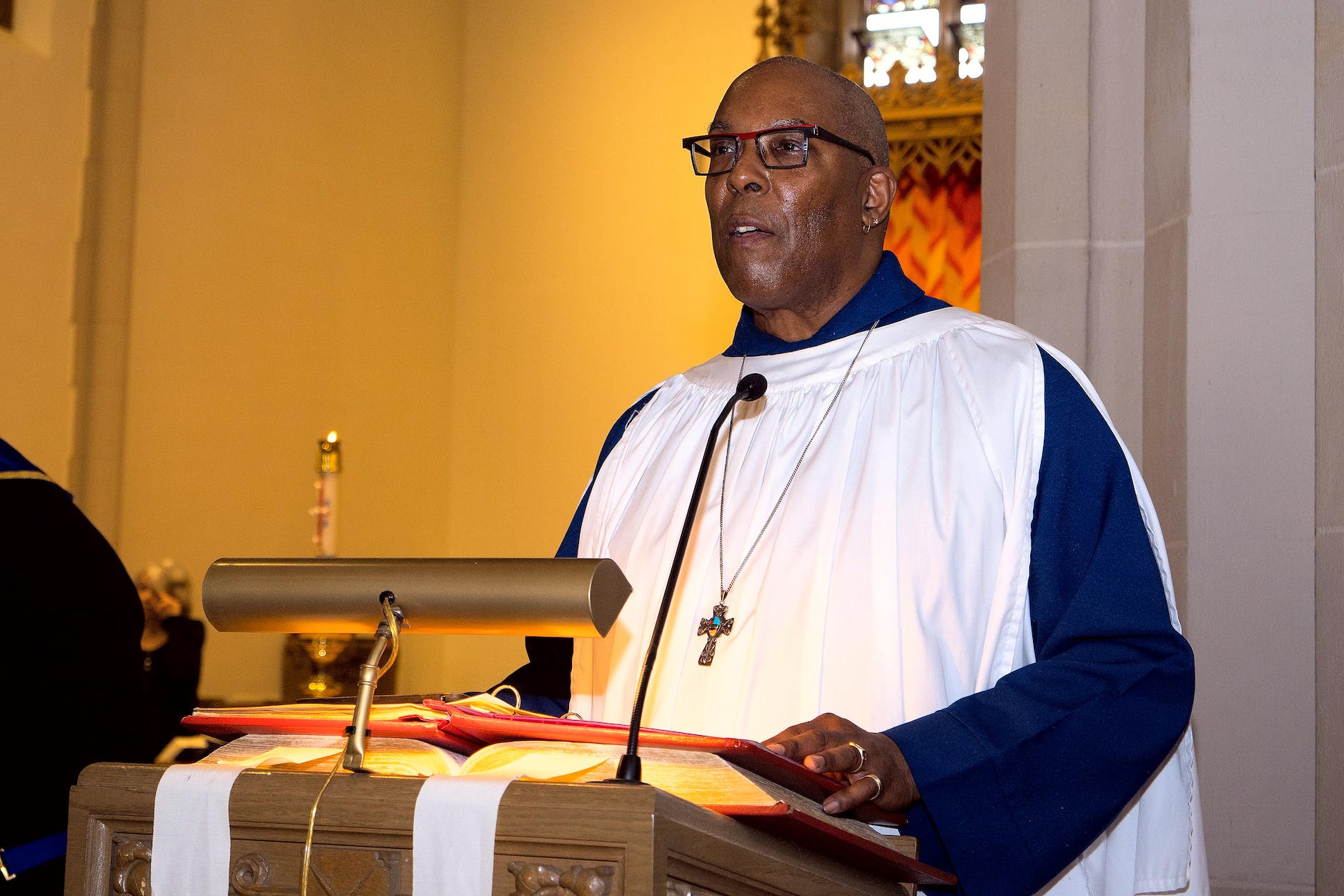 preacher at the altar